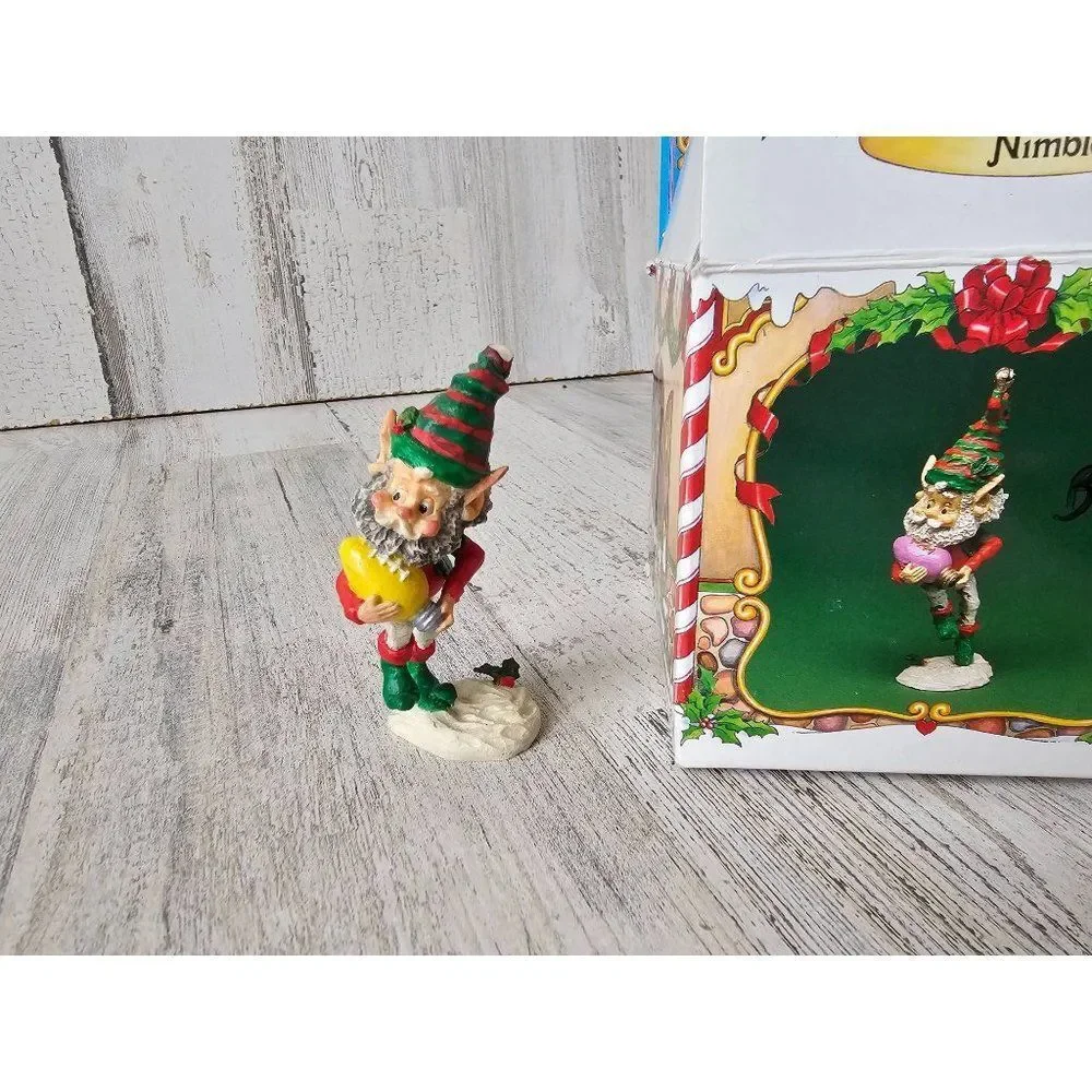 Enesco nimble AS IS football player Sandi zimnicki North Pole village elf vintag
